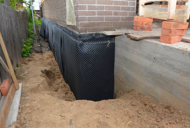 Happy homeowners after waterproofing job in Indian Trail